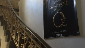 A staircase with ornate metal railings and a poster of 'Disney Fantasia Waltz' on the wall. - Loft 1. 3 in the heart of Berlin (Bezirk Friedrichshain-Kreuzberg)