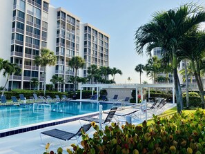 Outdoor pool, a heated pool - Fort Myers Beach Beachfront 1B/1B Condo Steps from the Gulf! (Fort Myers Beach)