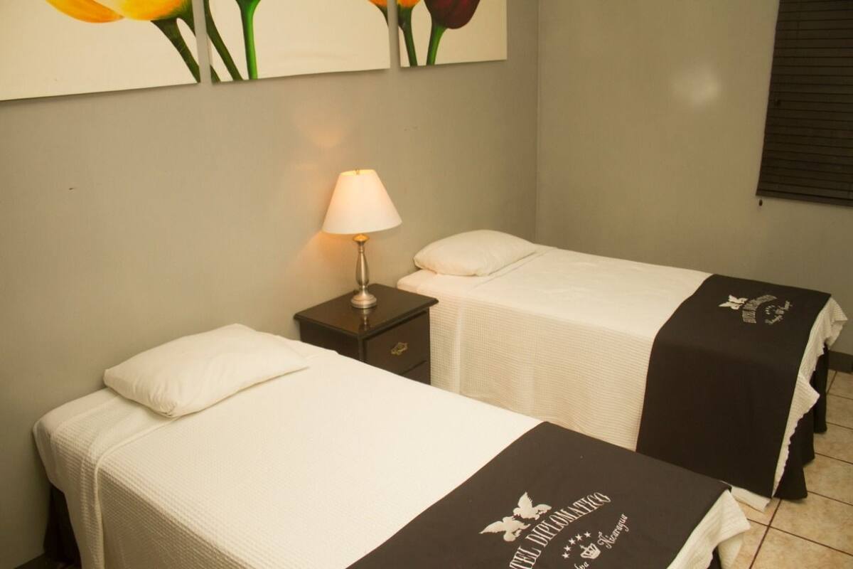 Triple Room, 3 Single Beds | Iron/ironing board, free WiFi, bed sheets