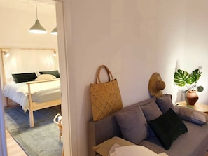 Individually decorated, desk, laptop workspace, iron/ironing board