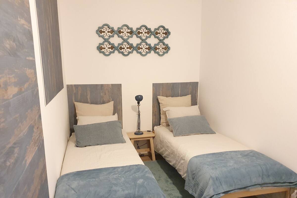 Individually decorated, desk, laptop workspace, iron/ironing board