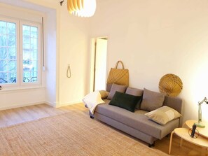 Individually decorated, desk, laptop workspace, iron/ironing board