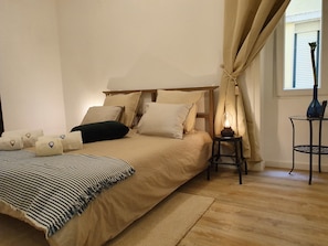 Individually decorated, desk, laptop workspace, iron/ironing board