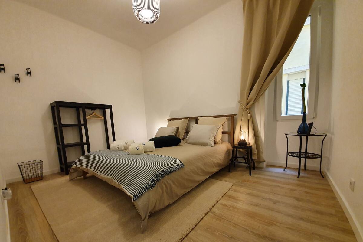 Individually decorated, desk, laptop workspace, iron/ironing board