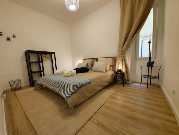 Individually decorated, desk, laptop workspace, iron/ironing board