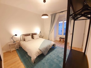 Individually decorated, desk, laptop workspace, iron/ironing board