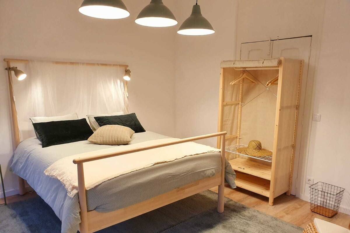 Individually decorated, desk, laptop workspace, iron/ironing board