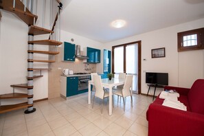 Apartment, 2 Bedrooms (App. 13) | Living area | TV
