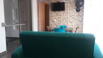 32-inch flat-screen TV with cable channels, TV