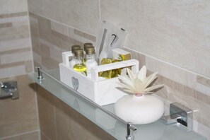 Hair dryer, towels, soap, shampoo