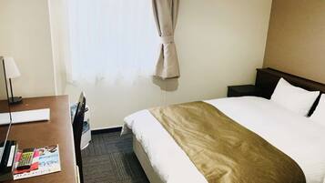 Desk, laptop workspace, free WiFi, bed sheets