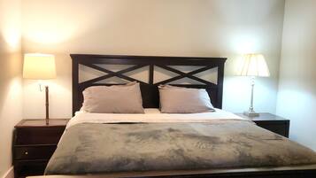 1 bedroom, desk, iron/ironing board, travel cot