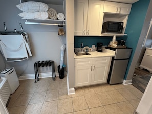 Fridge, microwave, coffee/tea maker, toaster