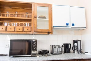Lägenhet Deluxe - 2 sovrum | Delat kök | Stort kylskåp, ugn, spishäll och kaffe- och tebryggare