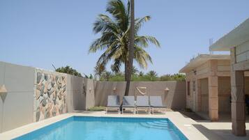 Outdoor pool, sun loungers