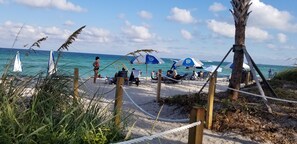 On the beach, sun loungers, beach umbrellas, beach towels