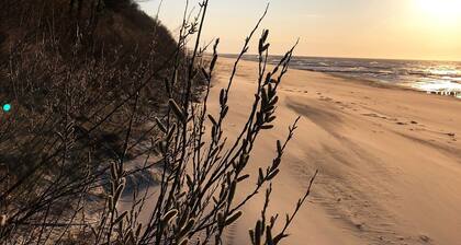 Modern vacation apartment "Momentum" with garden, directly on the Baltic Sea near Rewal