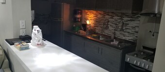 Modern spacious economy condo 50m from beach