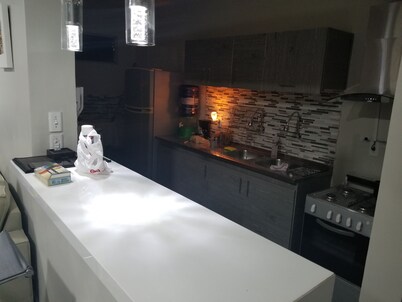 Modern spacious economy condo 50m from beach