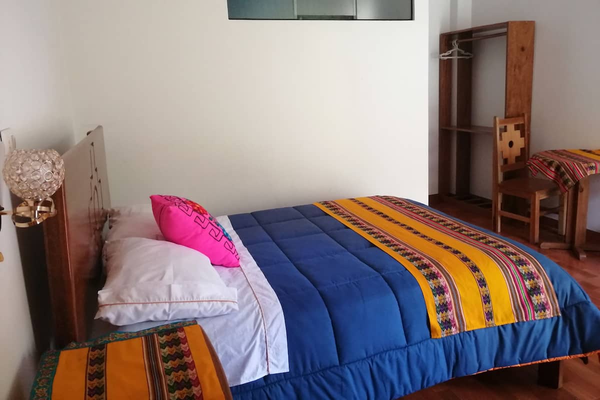 Desk, blackout curtains, free WiFi, bed sheets