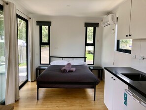 King Studio Cabin | Individually decorated, individually furnished, desk, laptop workspace