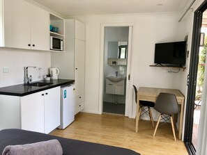 King Studio Cabin | Individually decorated, individually furnished, desk, laptop workspace