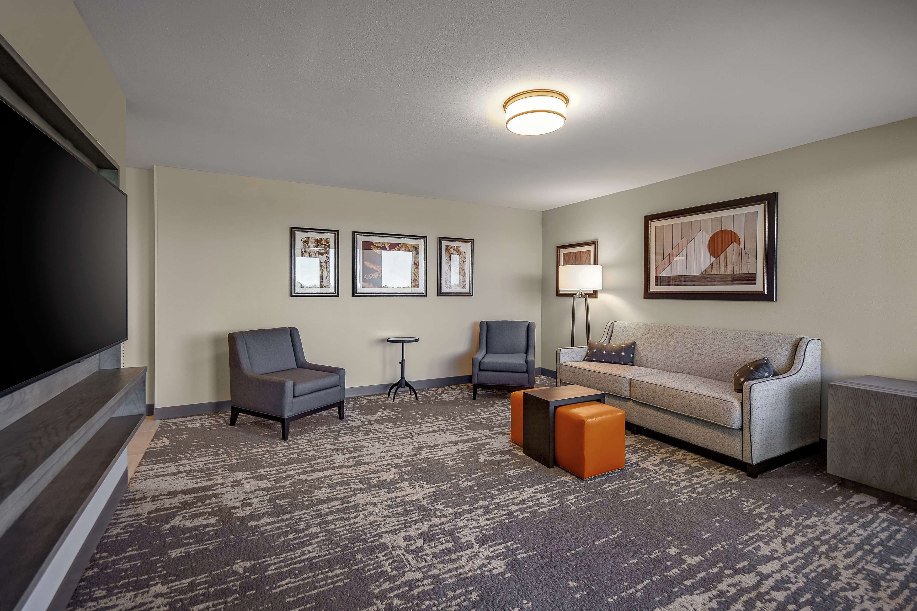 premium room, 1 king bed, accessible, bathtub | in-room safe, desk, laptop workspace, iron/ironing board