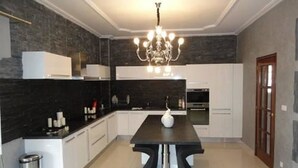 Comfort Villa, 6 Bedrooms | Private kitchen | Highchair, cookware/dishes/utensils - Villa French Luxe (Dakar)