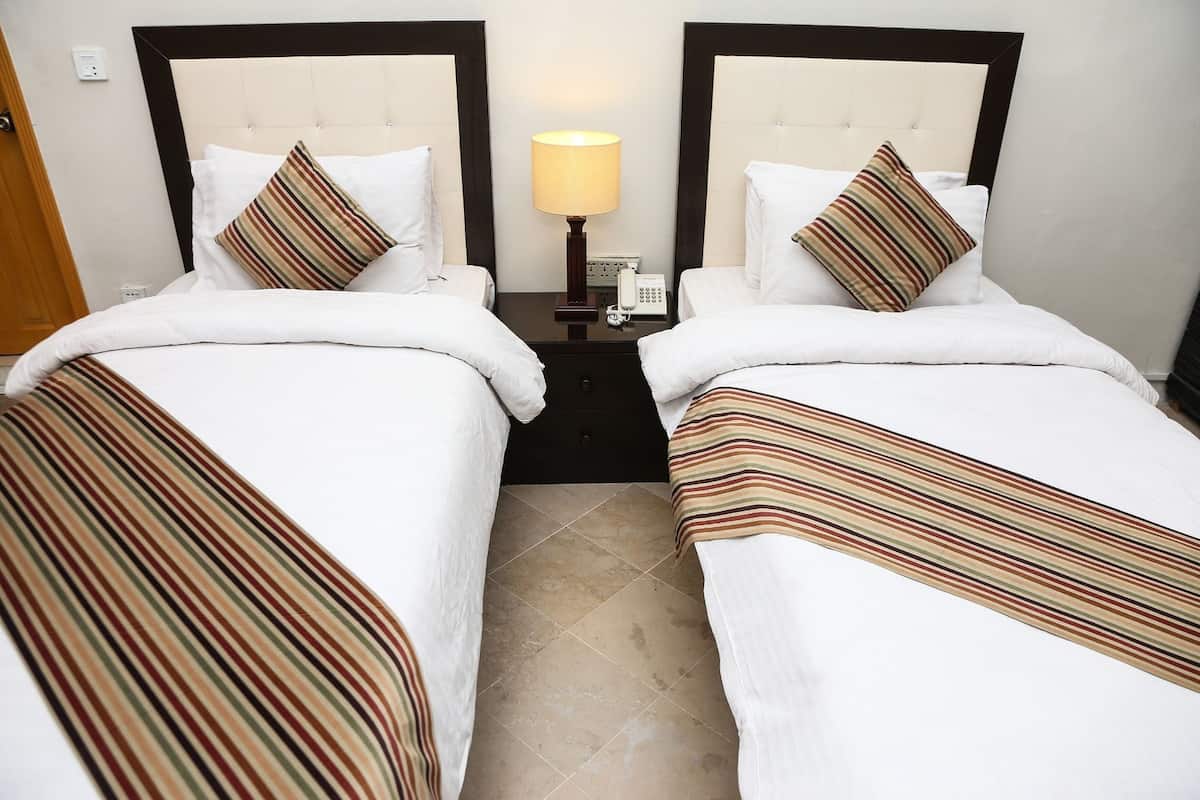 Chambre Standard avec lits jumeaux | Bureau, Wi-Fi gratuit, draps fournis