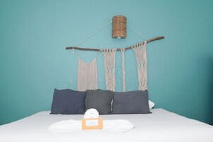 Family Room, 1 Bedroom | Down comforters, blackout drapes, iron/ironing board, free WiFi