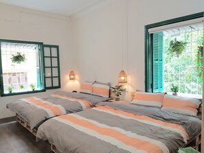 2 chambres, coffres-forts dans les chambres, fer et planche à repasser