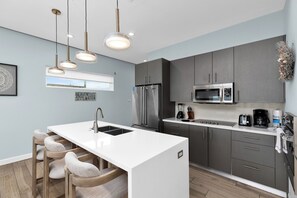 Fridge, microwave, oven, stovetop - Sleek Oceanfront Home with Private Pool, Hot Tub & Boardwalk Beach Access! (South Padre Island)