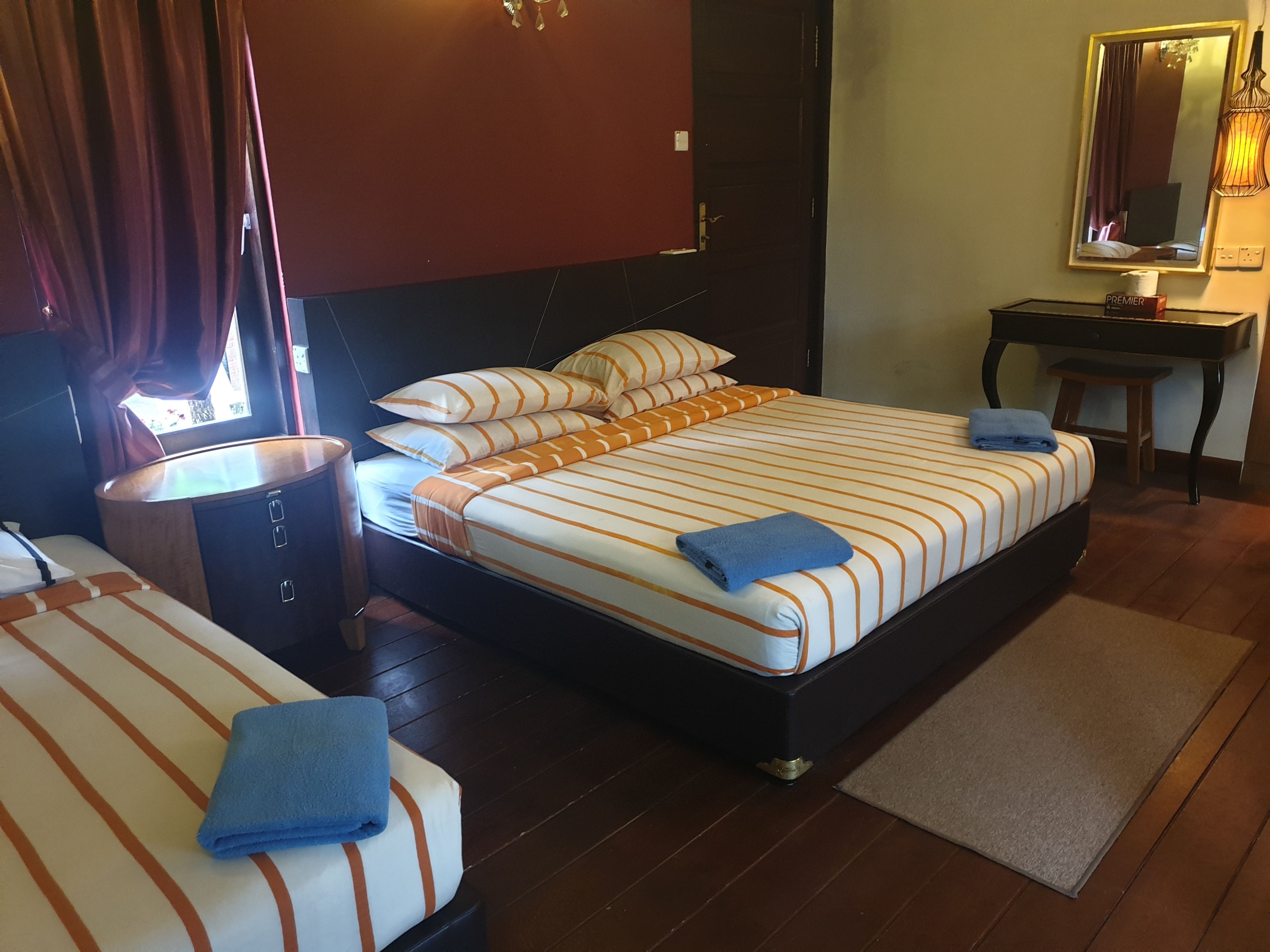 deluxe triple room, garden view | select comfort beds, individually decorated, individually furnished