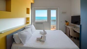 Quartos à prova de som, Wi-Fi de cortesia, roupa de cama
