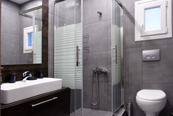 Luxury Apartment (Narcissus) | Bathroom | Shower, rainfall showerhead, free toiletries, hair dryer