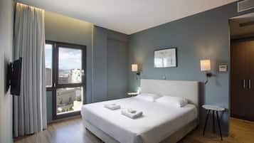 Junior suite, uitzicht op de stad | Een kluis op de kamer, verduisterende gordijnen, geluiddichte muren