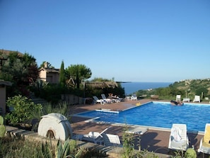 Outdoor pool, pool umbrellas, pool loungers