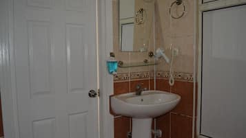 Shower, free toiletries, hair dryer, slippers