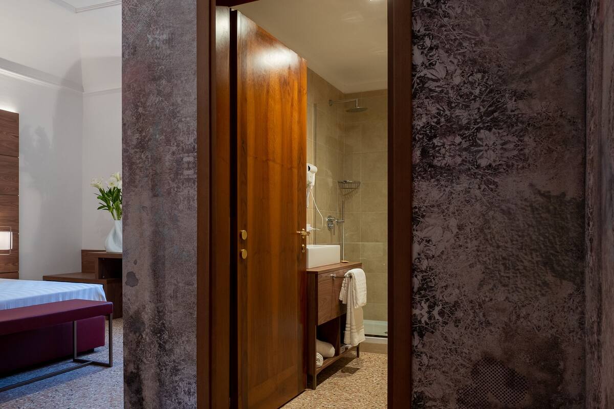superior room | bathroom | shower, rainfall showerhead, free toiletries, hair dryer