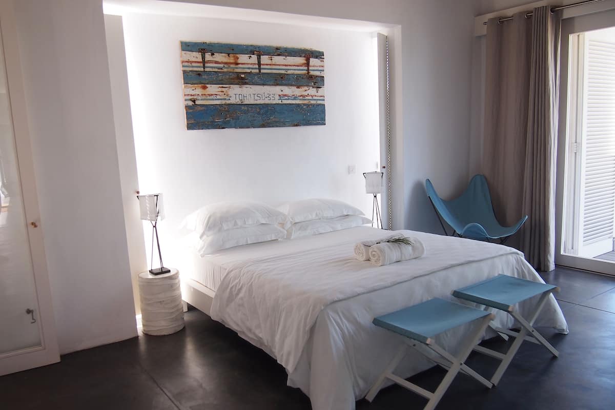 Villa | Lakens van Egyptisch katoen, luxe beddengoed, een minibar