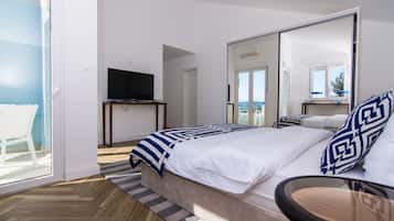 Appartement Luxe, plusieurs lits, vue mer | Literie de qualité supérieure, décoration personnalisée