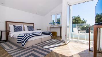 Luxury Apartment, Multiple Beds, Sea View | Premium bedding, individually decorated, individually furnished, desk