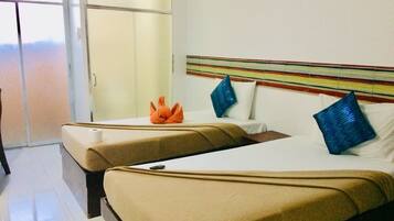 Deluxe Room, 2 Twin Beds | Rollaway beds, free WiFi, bed sheets