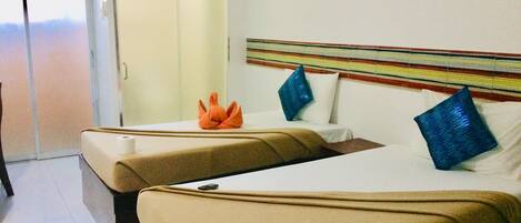 Camera Deluxe, 2 letti singoli | Letti aggiuntivi (a pagamento), Wi-Fi gratuito, lenzuola