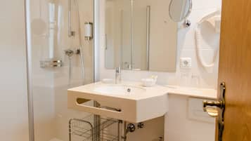 Shower, free toiletries, hair dryer, towels