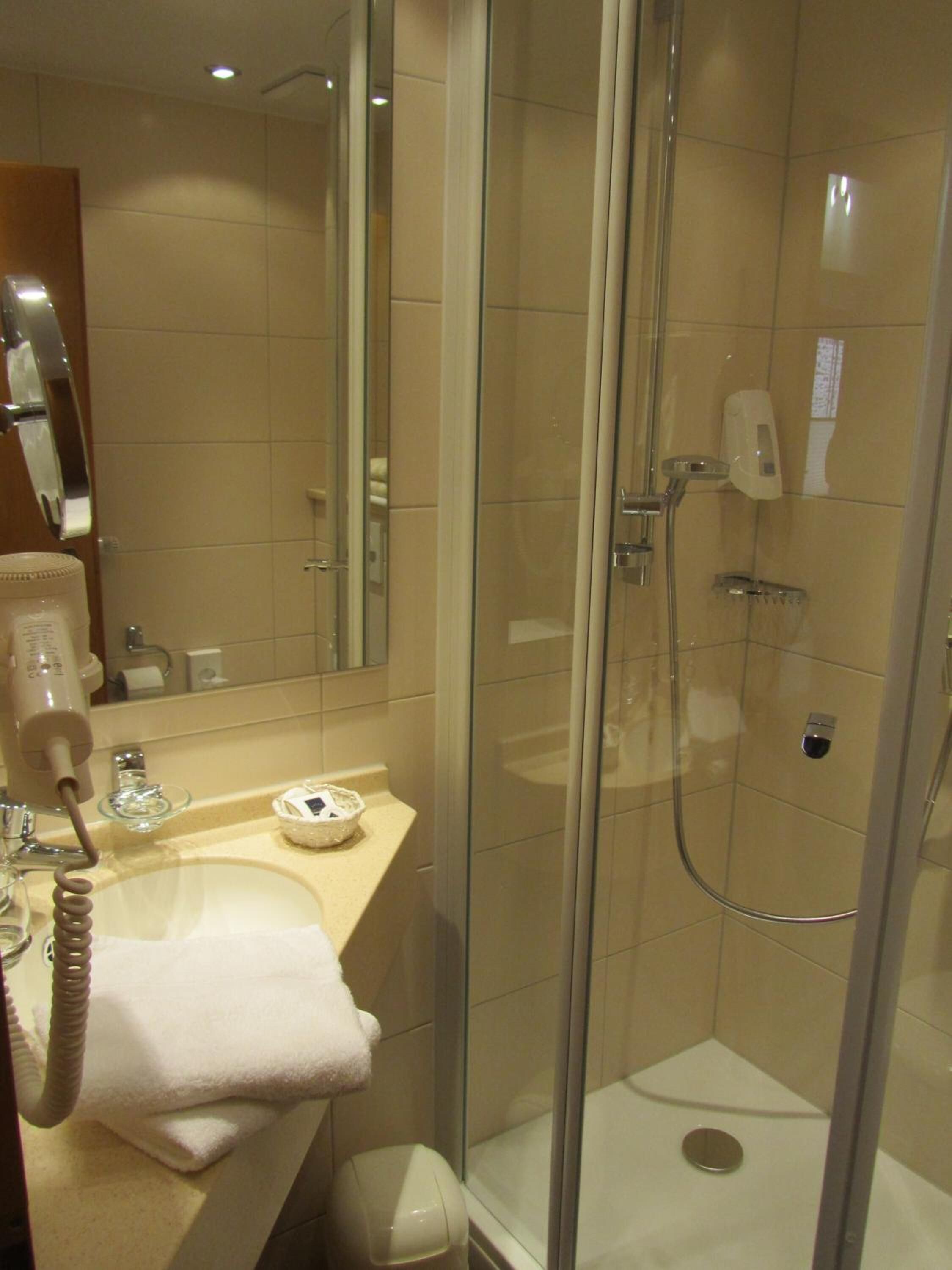 shower, free toiletries, hair dryer, towels