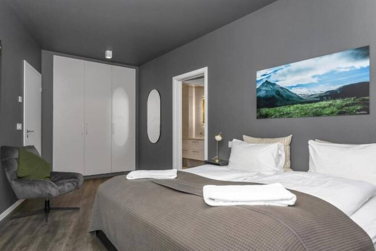 Laptop workspace, blackout curtains, soundproofing, iron/ironing board