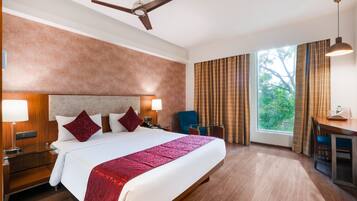 Deluxe Room, Non Smoking, City View | 1 bedroom, in-room safe, desk, laptop workspace