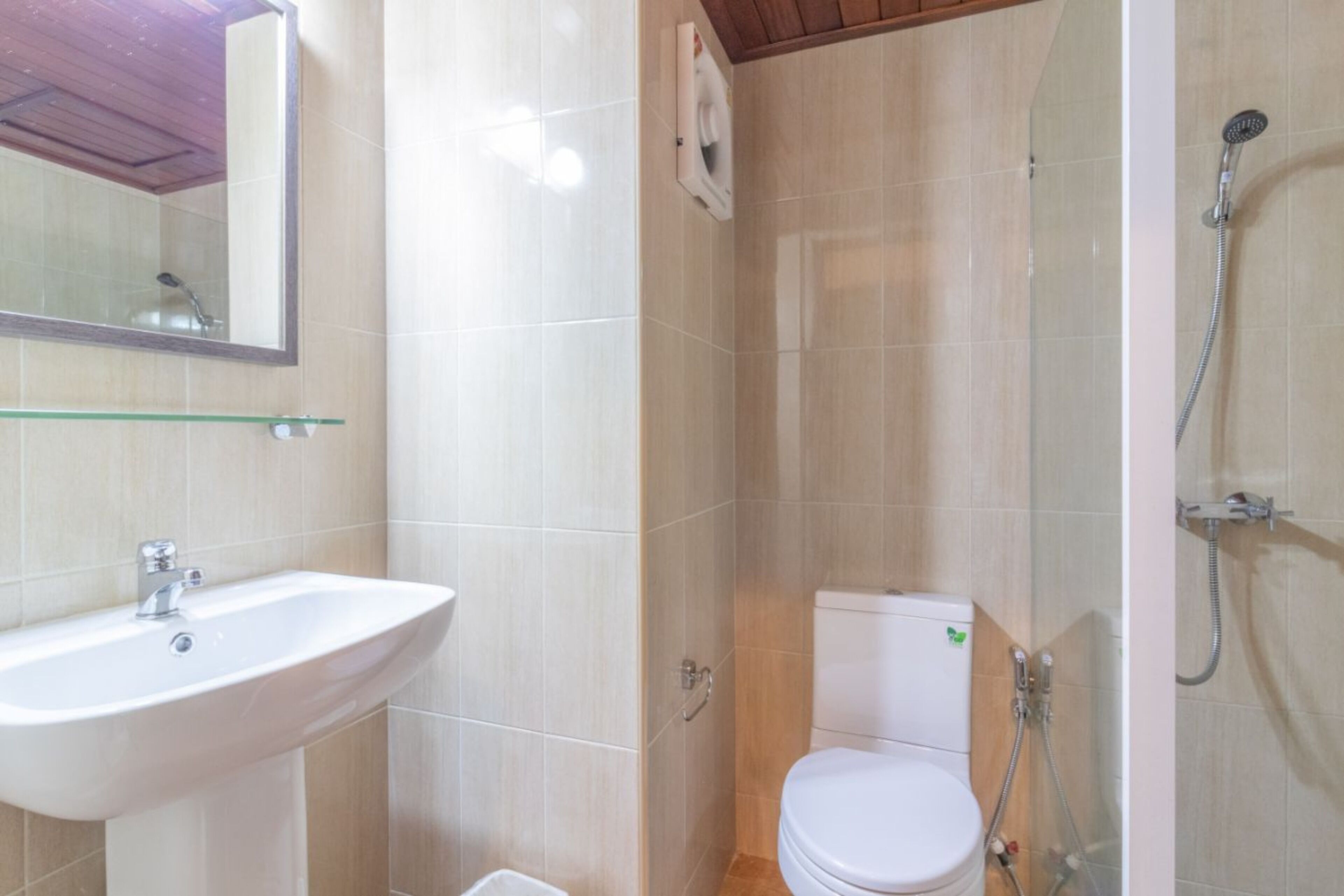 deluxe family room with two bathrooms | bathroom | shower, bidet, towels, soap