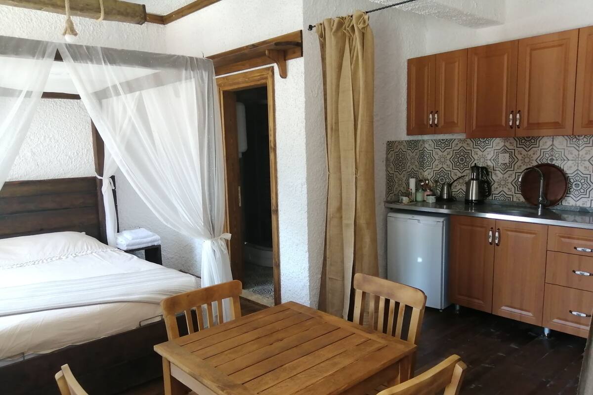 Premium bedding, desk, laptop workspace, soundproofing